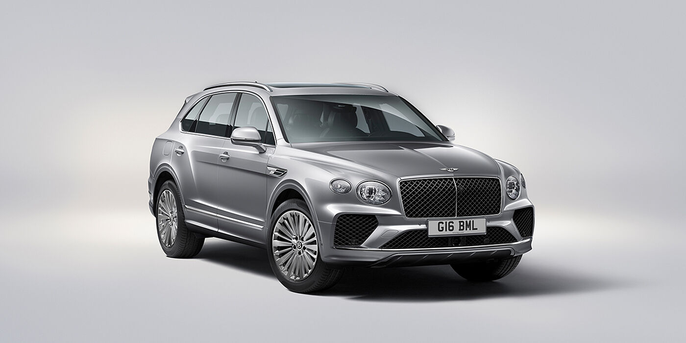 Bentley Vilnius Bentley Bentayga luxury SUV front three quarter view in Moonbeam paint with matrix grille and 21″ 5 spoke painted wheels