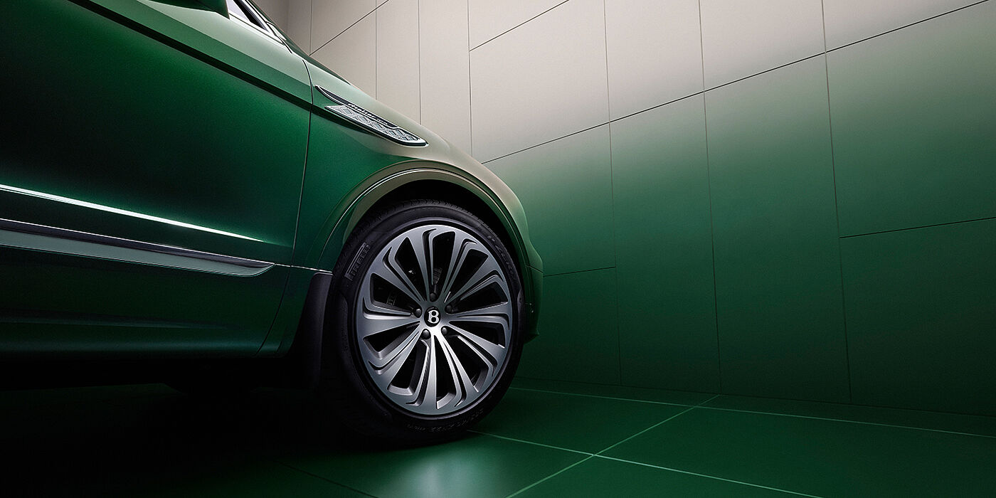 Bentley Vilnius Bentley Bentayga Atelier Edition SUV in Light Emerald green paint front side detail with 22 inch 10 spoke wheel