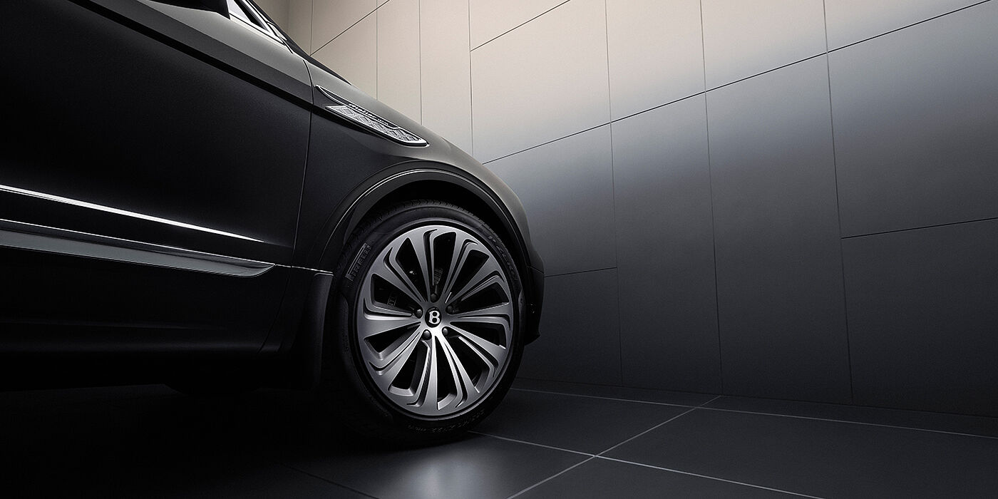 Bentley Vilnius Bentley Bentayga Atelier Edition SUV in Onyx black paint front side detail with 22 inch 10 spoke wheel